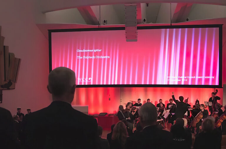 2014 award ceremony at Aalto University, with a stage set for speakers.