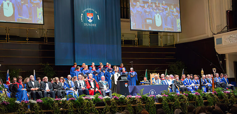 Ceremony at the University of Dundee in 2015 with attendees in academic regalia.